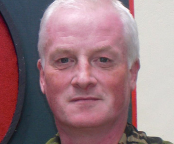 Headshot portrait of Colonel Tim Sandiford OBE